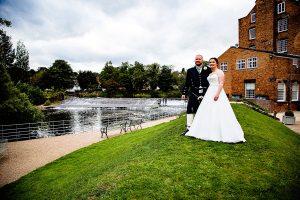 Bride and Groom next to River Derwent at The West Mill Derby