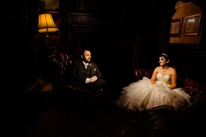 Bride and groom sitting and chilling at Rothley Hall Leicestershire