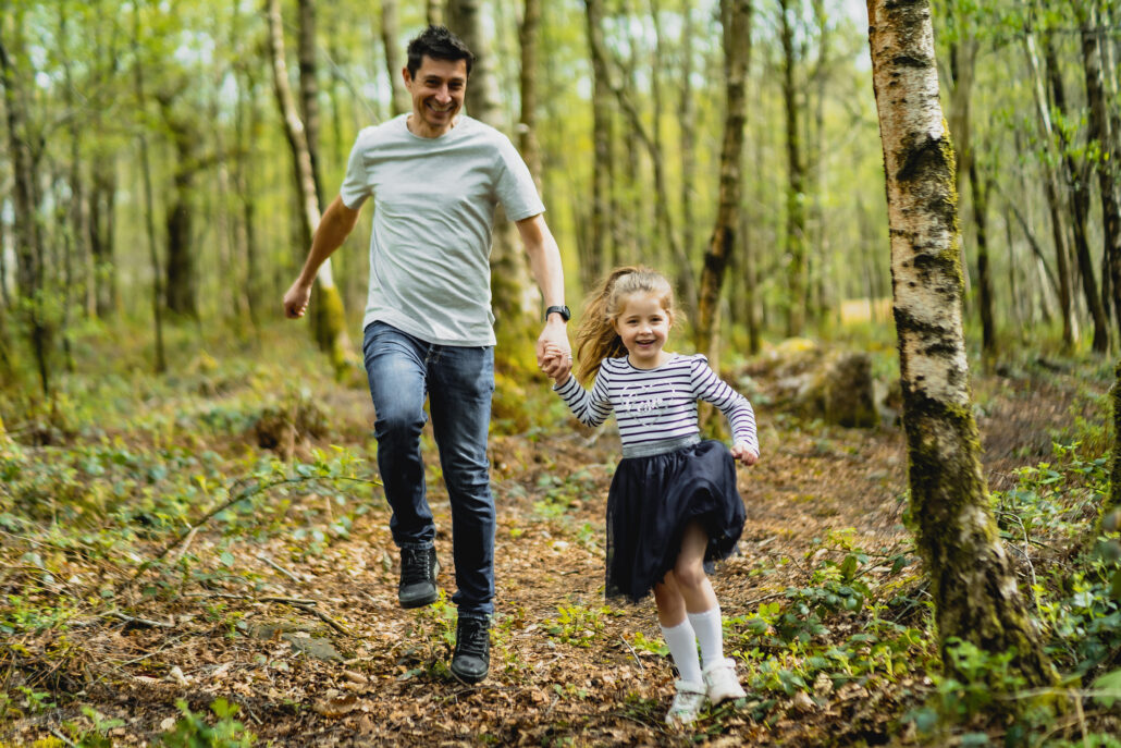 Father and daughter running